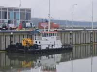 Multicat multipurpose vessel with hydraulic crane & spud pole legs